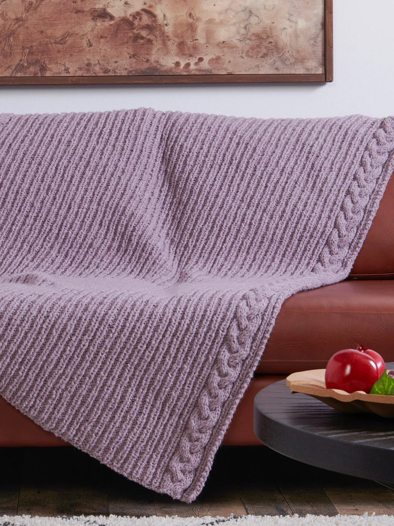 Lots of Ribs & Cable Edges Knit Blanket by Bernat Design Studio