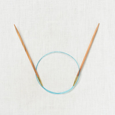 Addi Olive Wood Fixed Circular 24"