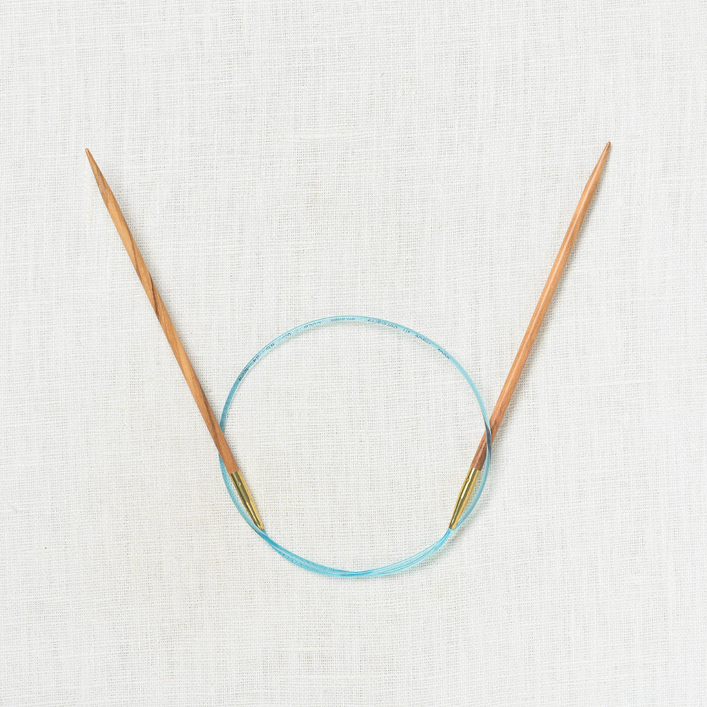 Addi Olive Wood Fixed Circular 24"