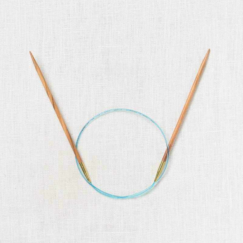 Addi Olive Wood Fixed Circular 24"