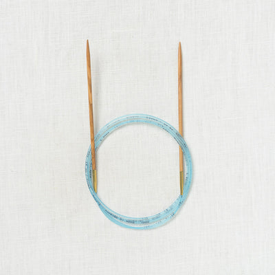 Addi Olive Wood Fixed Circular 60"