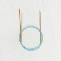 Addi Olive Wood Fixed Circular 60"