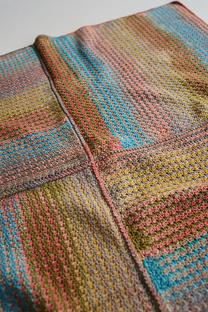 Puppytooth Blanket by Nina Holubcova