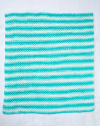Textured Baby Afghan (Knit) by Lion Brand Yarn