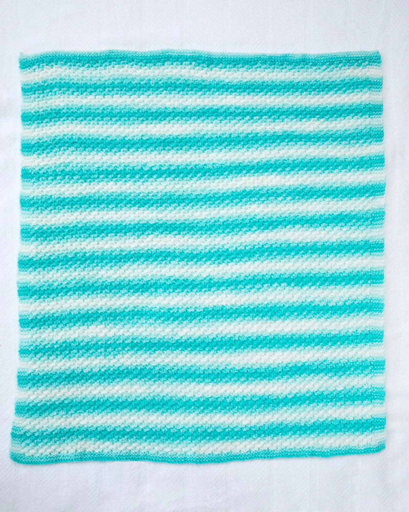 Textured Baby Afghan (Knit) by Lion Brand Yarn